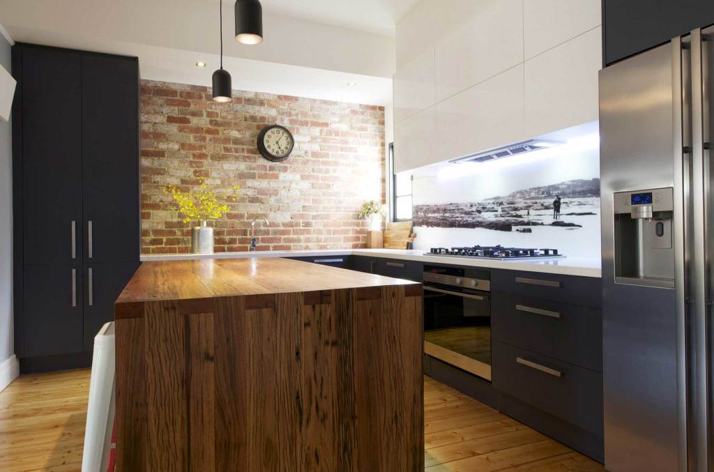 Timber and exposed brick kitchen features