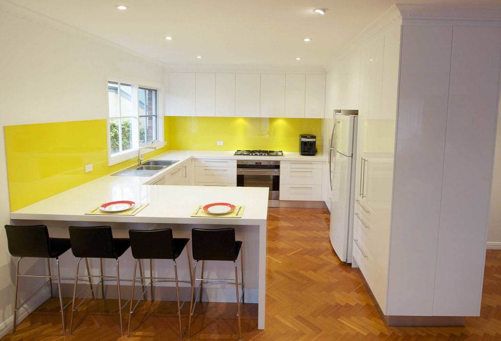 Camberwell kitchen with yellow glass splashback