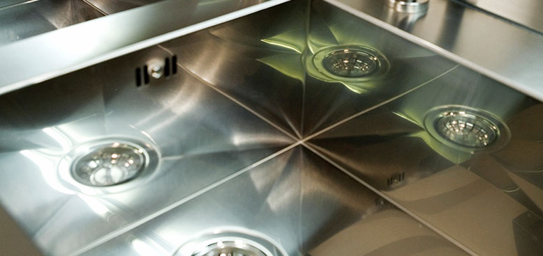 Image of a Stainless steel kitchen bench