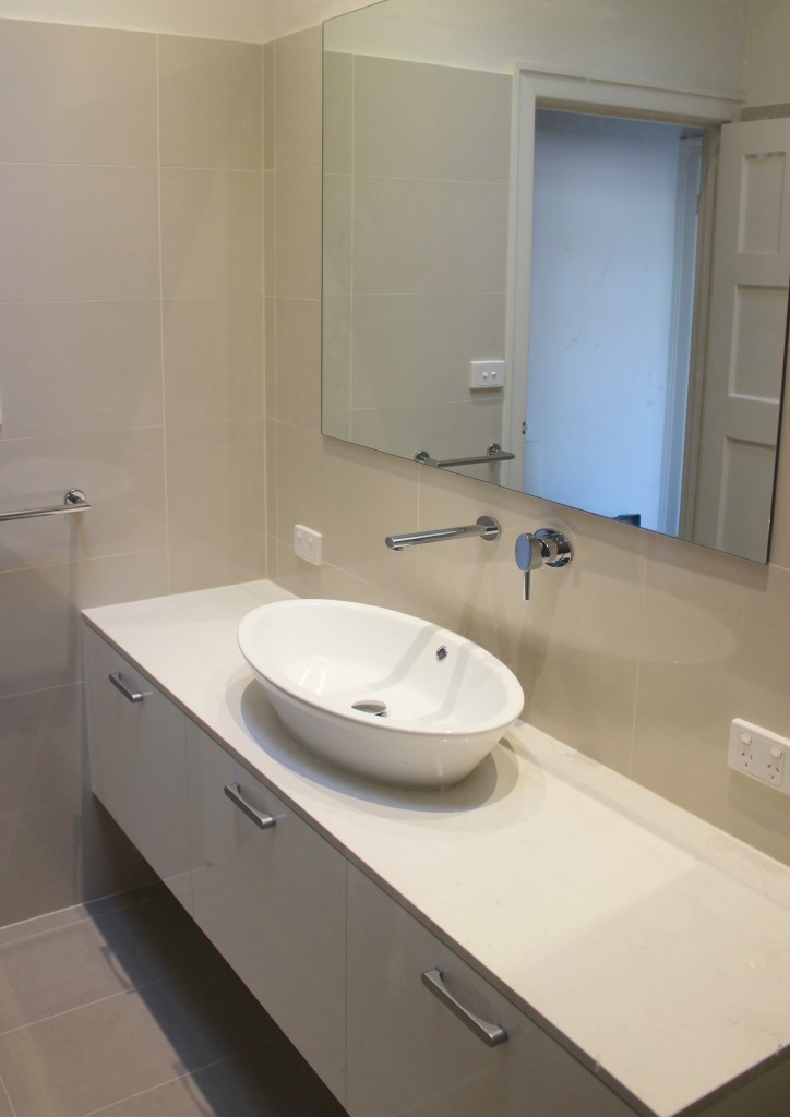 overhead image of bathroom sink and cabinets in Armadale renovation project