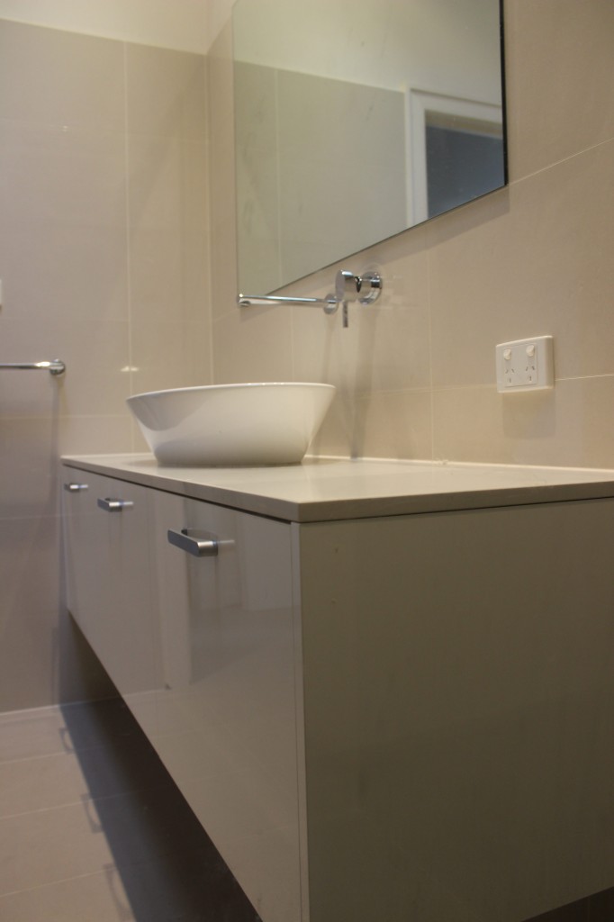 image of bathroom sink and cabinetry